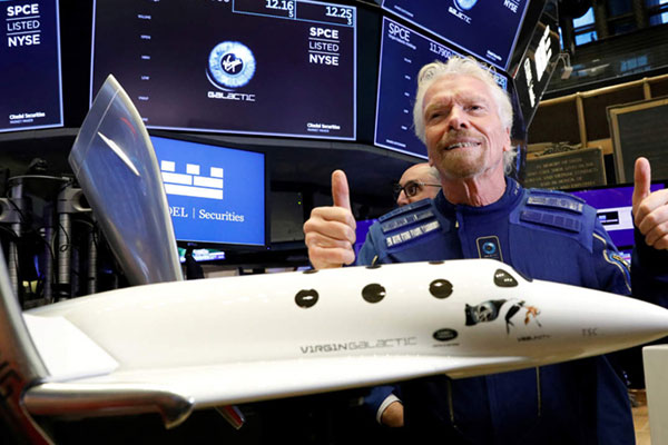 Richard Branson returns to Earth after space travel in his own spacecraft