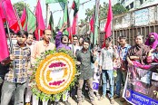 নিহতদের স্মরণে ফুলেল শ্রদ্ধা ও মালিকের শাস্তি দাবি