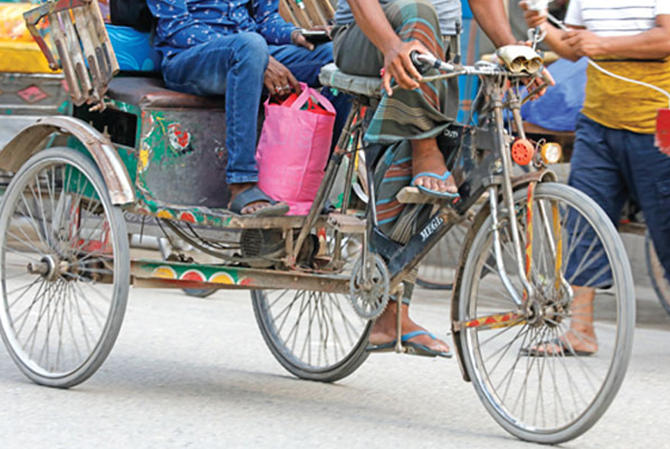 Battery-run rickshaws occupy Dhaka's streets at night