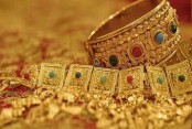 Gold price drops by Tk 3,138 per bhori

