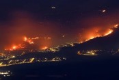 Forest fires blaze in north Israel after rockets launched from Lebanon