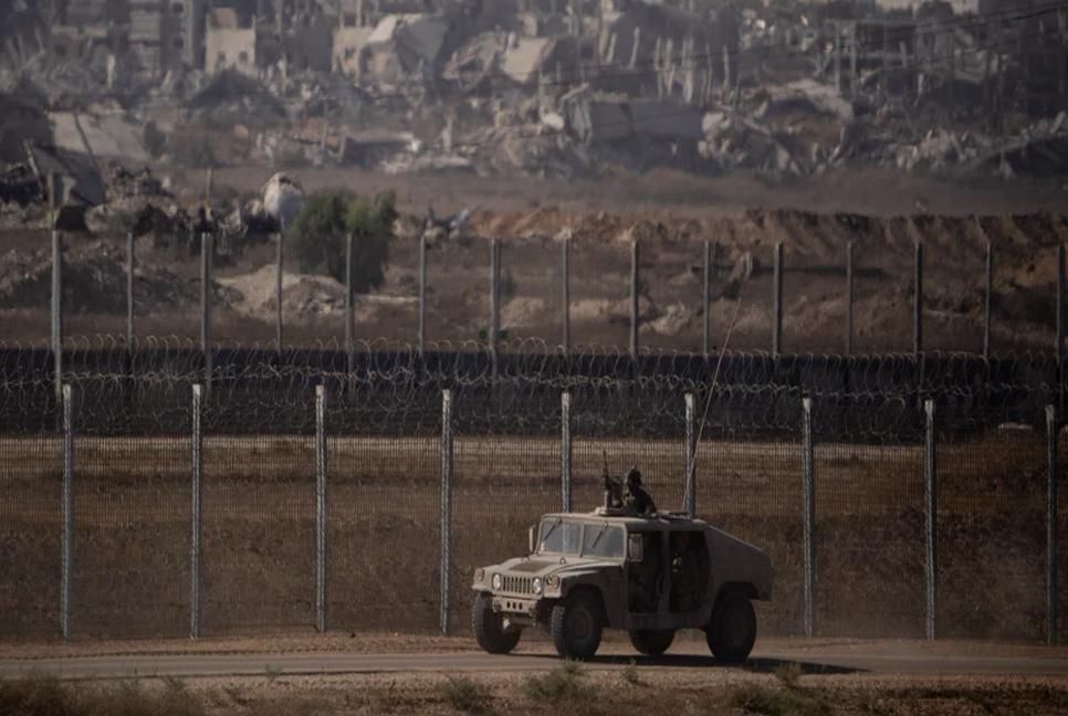 Israeli forces push deeper into Gaza as Hamas warns escalation 