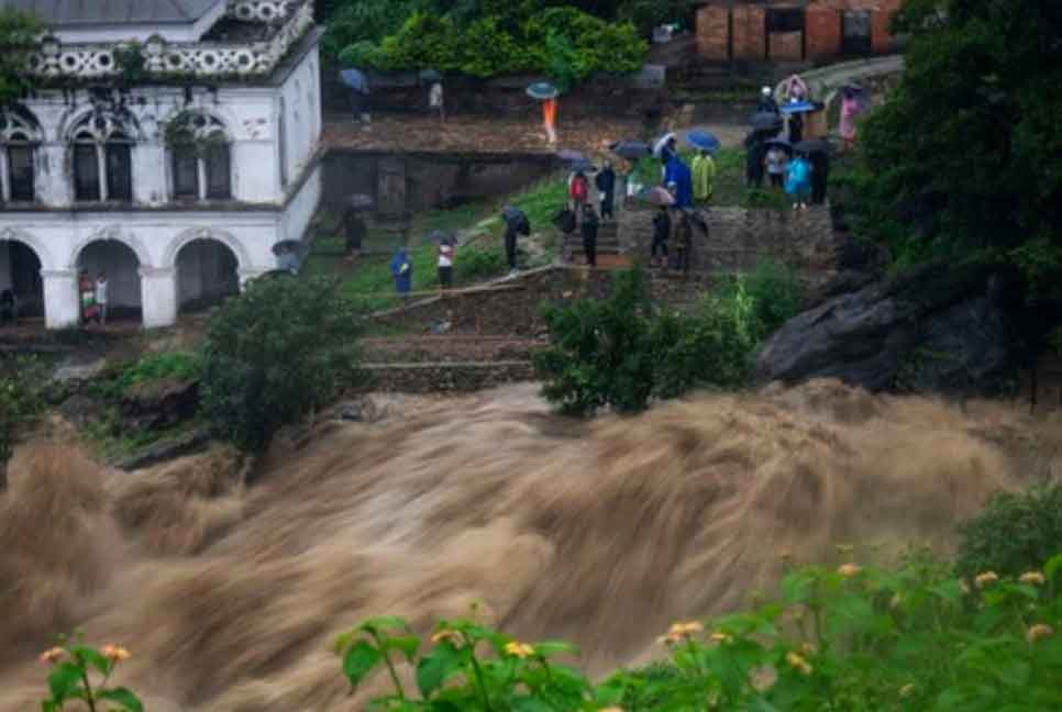 63 missing as landslide sweeps 2 buses into Nepal river

